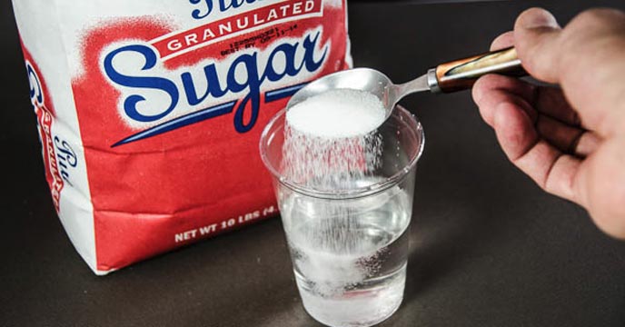 A b of sugar. Sugar Water. Dissolved Sugar Laboratory. Sugar Chemistry. Dissolved Sugar in a Chemical dish.